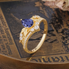 Nature-Inspired Pear-Cut Natural Tanzanite Couple's Engagement Ring Set