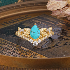 Nature-Inspired Pear-Cut Turquoise Couple's Engagement Ring Set