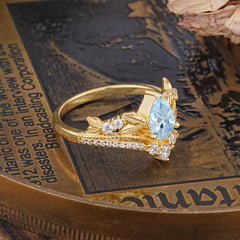 Nature-Inspired Pear-Cut Aquamarine Couple's Engagement Ring Set