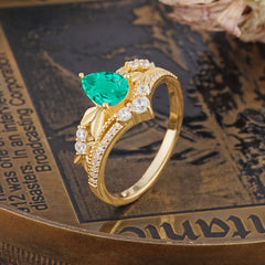 Nature-Inspired Pear-Cut Emerald Couple's Engagement Ring Set