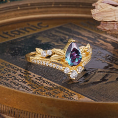 Nature-Inspired Pear-Cut Alexandrite Couple's Engagement Ring Set