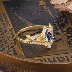 Nature-Inspired Pear-Cut Alexandrite Couple's Engagement Ring Set