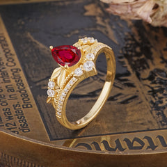 Nature-Inspired Pear-Cut Ruby Couple's Engagement Ring Set