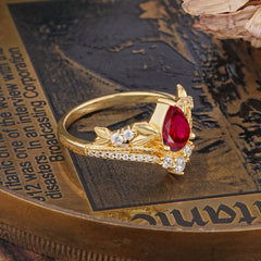 Nature-Inspired Pear-Cut Ruby Couple's Engagement Ring Set