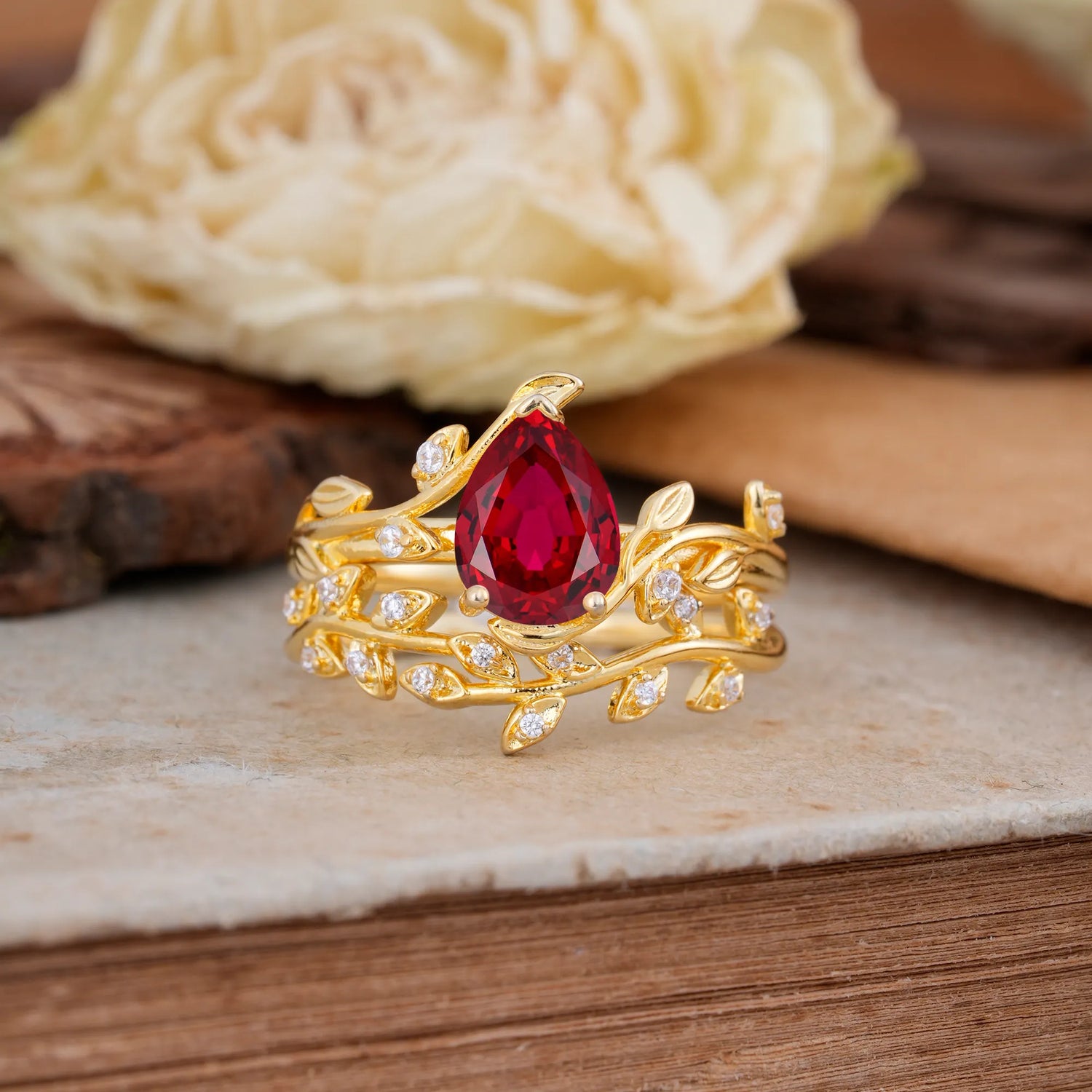Nature-Inspired Leaf Pear Cut Ruby Bridal Ring Set