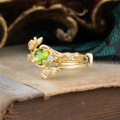 Floral themed 4 Prong Round Peridot Wedding Ring Set
