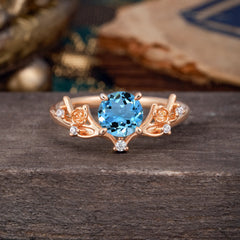 Nature-Inspired 4-Prong Round Aquamarine Engagement Ring
