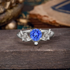 Nature-Inspired 4-Prong Round Sapphire Engagement Ring