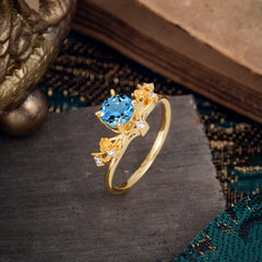 Nature-Inspired 4-Prong Round Aquamarine Engagement Ring