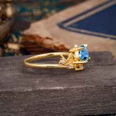 Nature-Inspired 4-Prong Round Aquamarine Engagement Ring