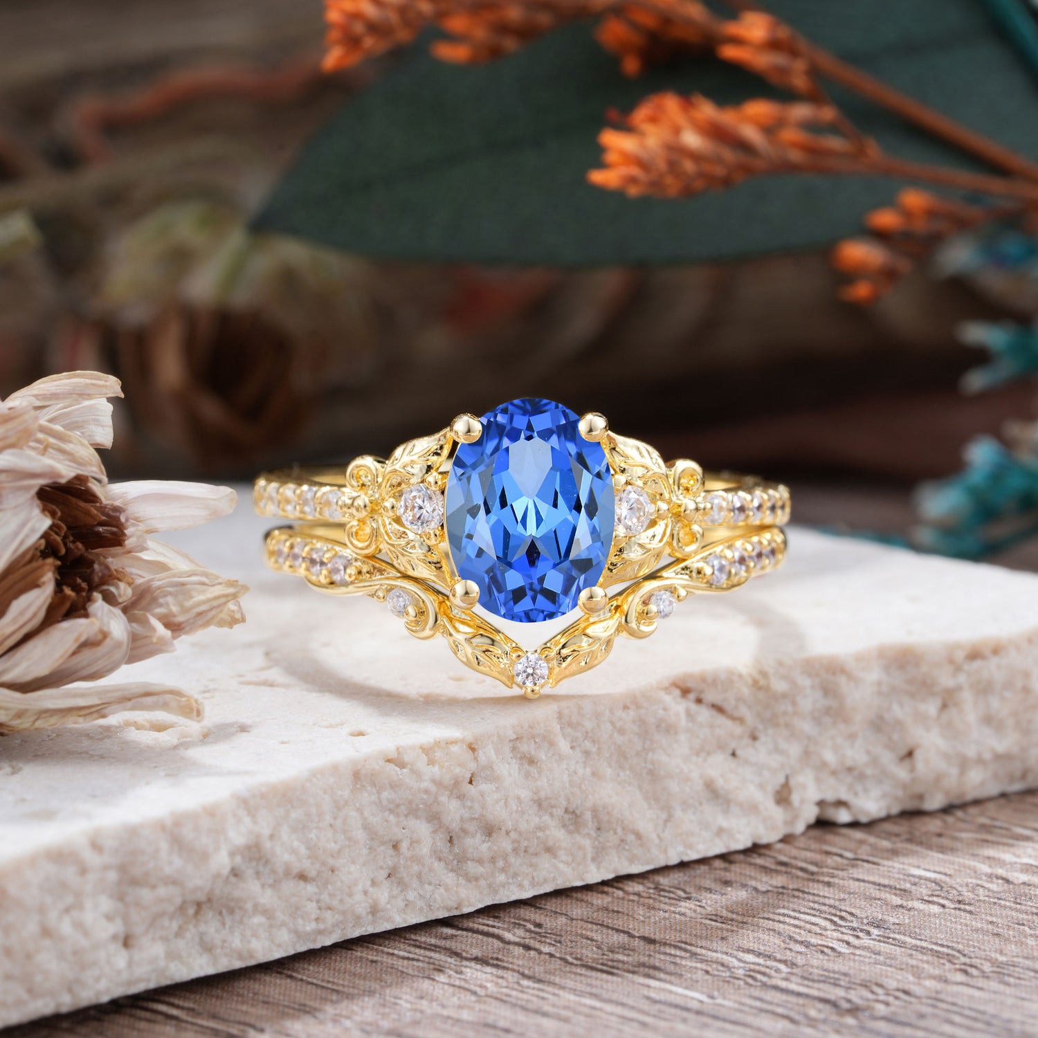 Naturally Inspired Luxury 4-Prong Oval Cut Sapphire Bridal Ring Set