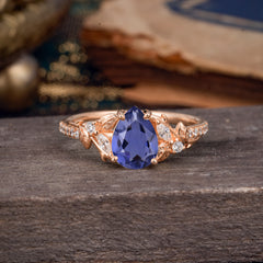 Nature-Inspired Classic Luxe 4-Prong Pear-Cut Tanzanite Engagement Ring