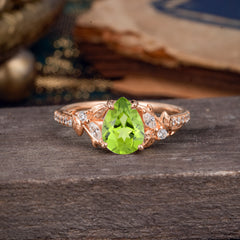 Nature-Inspired Classic Luxe 4-Prong Pear-Cut Peridot Engagement Ring