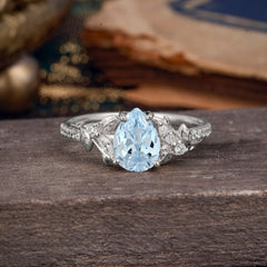Nature-Inspired Classic Luxe 4-Prong Pear-Cut Aquamarine Engagement Ring