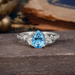 Nature-Inspired Classic Luxe 4-Prong Pear-Cut Aquamarine Engagement Ring