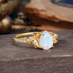 Nature-Inspired Classic Luxe 4-Prong Pear-Cut Opal Engagement Ring
