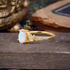 Nature-Inspired Classic Luxe 4-Prong Pear-Cut Opal Engagement Ring