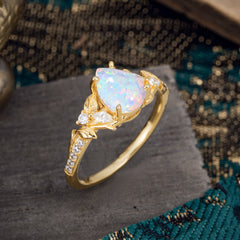 Nature-Inspired Classic Luxe 4-Prong Pear-Cut Opal Engagement Ring