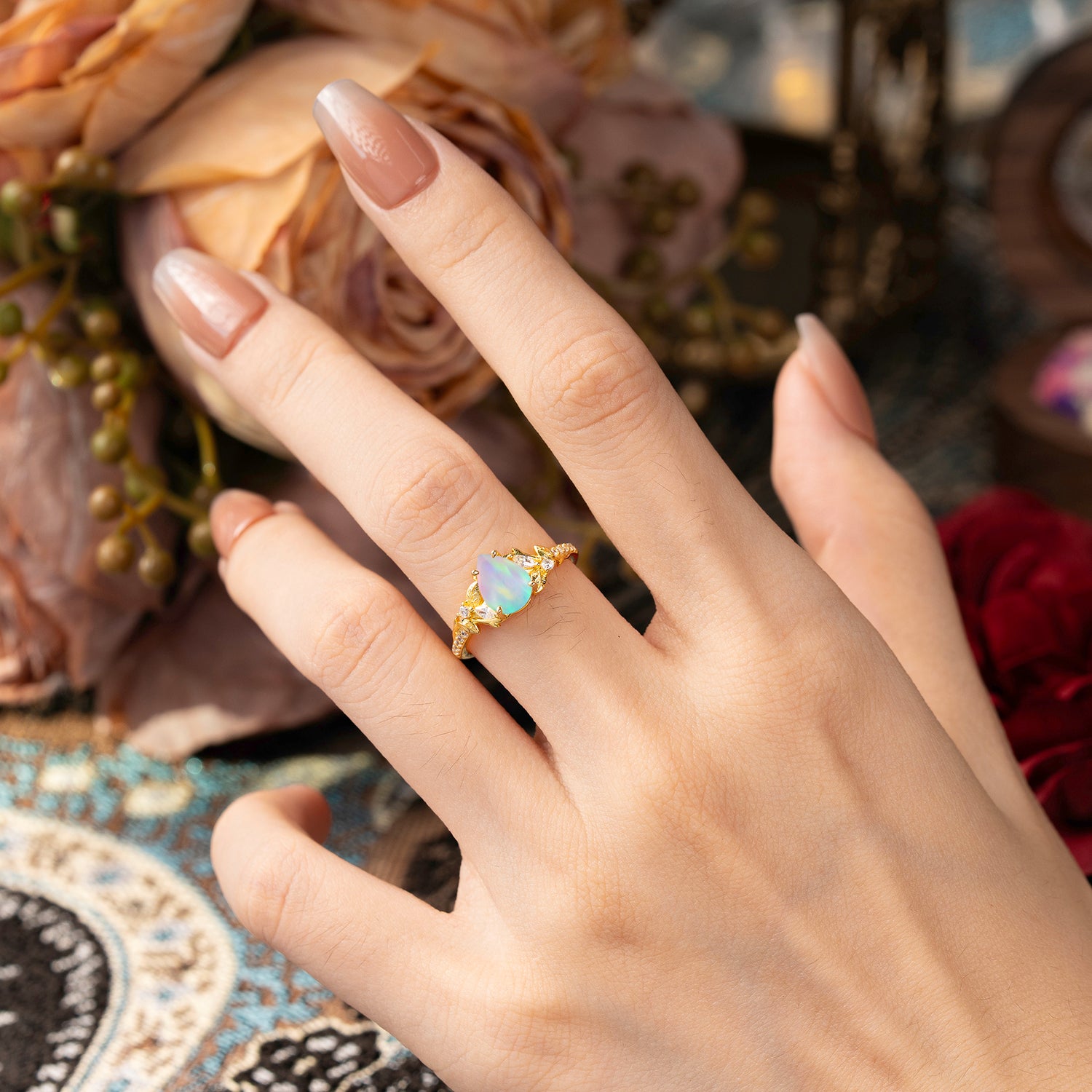 Nature-Inspired Classic Luxe 4-Prong Pear-Cut Opal Engagement Ring