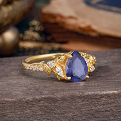 Nature-Inspired Classic Luxe 4-Prong Pear-Cut Tanzanite Engagement Ring