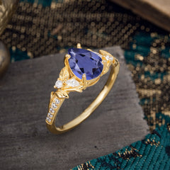 Nature-Inspired Classic Luxe 4-Prong Pear-Cut Tanzanite Engagement Ring