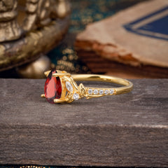 Nature-Inspired Classic Luxe 4-Prong Pear-Cut Garnet Engagement Ring