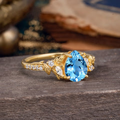Nature-Inspired Classic Luxe 4-Prong Pear-Cut Aquamarine Engagement Ring