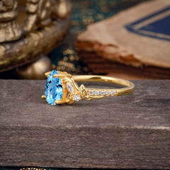 Nature-Inspired Classic Luxe 4-Prong Pear-Cut Aquamarine Engagement Ring