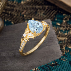 Nature-Inspired Classic Luxe 4-Prong Pear-Cut Aquamarine Engagement Ring
