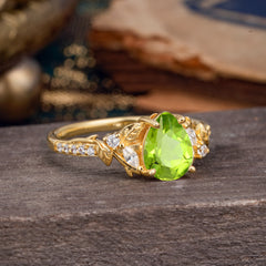 Nature-Inspired Classic Luxe 4-Prong Pear-Cut Peridot Engagement Ring