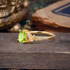 Nature-Inspired Classic Luxe 4-Prong Pear-Cut Peridot Engagement Ring