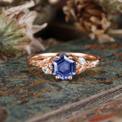 Nature-Inspired 4 - Prong Hexagon - Cut Tanzanite Ring