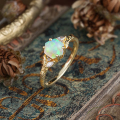 Nature-Inspired 4 - Prong Kite - Cut Natural Opal Ring