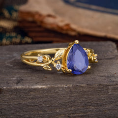 Luxury Nature-Inspired 3-Prong Pear-Cut Tanzanite Engagement Ring