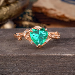 Nature-Inspired 3-Prong Heart-Shaped Emerald Engagement Ring