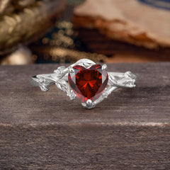 Nature-Inspired 3-Prong Heart-Shaped Garnet Engagement Ring