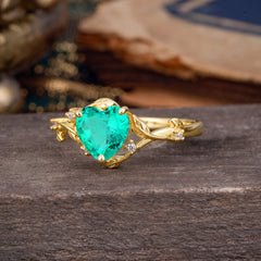 Nature-Inspired 3-Prong Heart-Shaped Emerald Engagement Ring