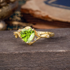 Nature-Inspired 3-Prong Heart-Shaped Peridot Engagement Ring