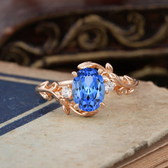 Contemporary Nature-Inspired 4-Prong Oval-Cut  Sapphire Engagement Ring
