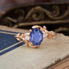 Contemporary Nature-Inspired 4-Prong Oval-Cut Natural Tanzanite Engagement Ring