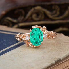 Contemporary Nature-Inspired 4-Prong Oval-Cut Natural Emerald Engagement Ring
