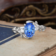 Contemporary Nature-Inspired 4-Prong Oval-Cut  Sapphire Engagement Ring