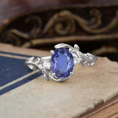 Contemporary Nature-Inspired 4-Prong Oval-Cut Natural Tanzanite Engagement Ring