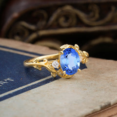 Contemporary Nature-Inspired 4-Prong Oval-Cut  Sapphire Engagement Ring