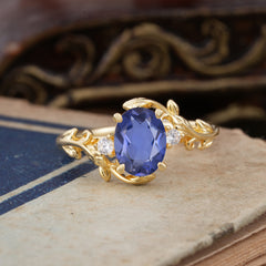 Contemporary Nature-Inspired 4-Prong Oval-Cut Natural Tanzanite Engagement Ring