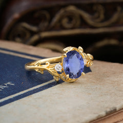 Contemporary Nature-Inspired 4-Prong Oval-Cut Natural Tanzanite Engagement Ring