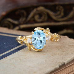 Contemporary Nature-Inspired 4-Prong Oval-Cut Natural Aquamarine Engagement Ring
