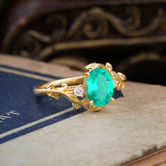 Contemporary Nature-Inspired 4-Prong Oval-Cut Natural Emerald Engagement Ring