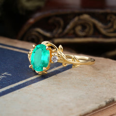 Contemporary Nature-Inspired 4-Prong Oval-Cut Natural Emerald Engagement Ring