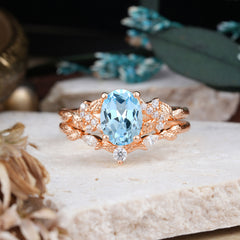 Nature-Inspired Luxury 4-Prong Oval-Cut Aquamarine Engagement Ring Set